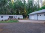 Beautiful 1600Sqft 3/2 Home Located on 1 Acre Lot with Huge 3-Car Unattached Work Shop on Right side.