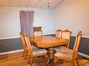 Dinning Room with Custom Wood Laminate Flooring.