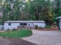 Beautiful 1680 Sqft 3/2 Home Located on 1 Acre Lot with Huge 3-Car Unattached Work Shop on Right side.