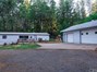 Beautiful 1680Sqft 3/2 Home Located on 1 Acre Lot with Huge 3-Car Unattached Work Shop on Right side.