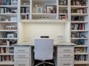 Office with beautiful built in bookshelves, desk and ca