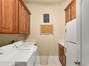 Laundry Room Near Guest Bedrooms & Garage