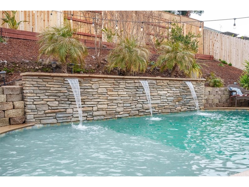 Inviting Pool With Water Falls & Sun-Shelf End to Sit & Play