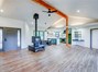 Beautiful Beam Spans the Living Space