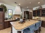 Spacious kitchen with solid limestone counters.