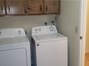 Separate Laundry Room area with good working appliances.