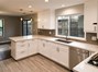 Fabulous new kitchen! Porcelain tile, Quartz counter tops and quarz single-bowl sink.