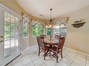Breakfast Nook off the Kitchen with tons of windows and French Door to the Outside Patio. Sunny & Bright!