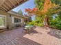 Large Brick Patio for all of your entertaining needs with a canopy of trees to shade you in the Summer!