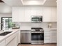 Gorgeous Quartz counters and newer stainless appliances