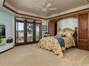 Beautiful Master Suite with French door leading out to cover ed patio.