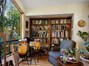 Built-in bookshelves in a little nook overlooking the front of the property.