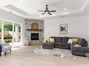 Large Livingroom centers on a floor to ceiling gas fireplace