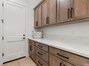 Large laundry room with fold counter