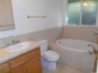 MASTER BATH,JETTED TUB AND TILED SHOWER