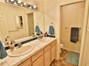 This two-room bathroom shares this space to help you during those early morning rush hours!