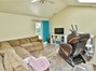The family room has a door that goes out to your big back yard. Check out the very nice laundry room nearby.