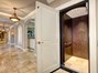 ELEVATOR TO GARAGE LEVEL-EASE OF BRINGING YOUR GROCERIES UP TO THE LARGE WALK-IN PANTRY