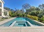 ... lush backyard featuring pool and spa...